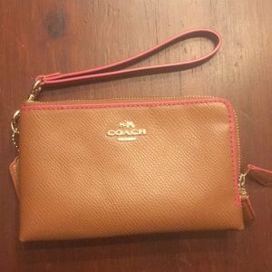 Coach camel and pink pebbled leather wristlet